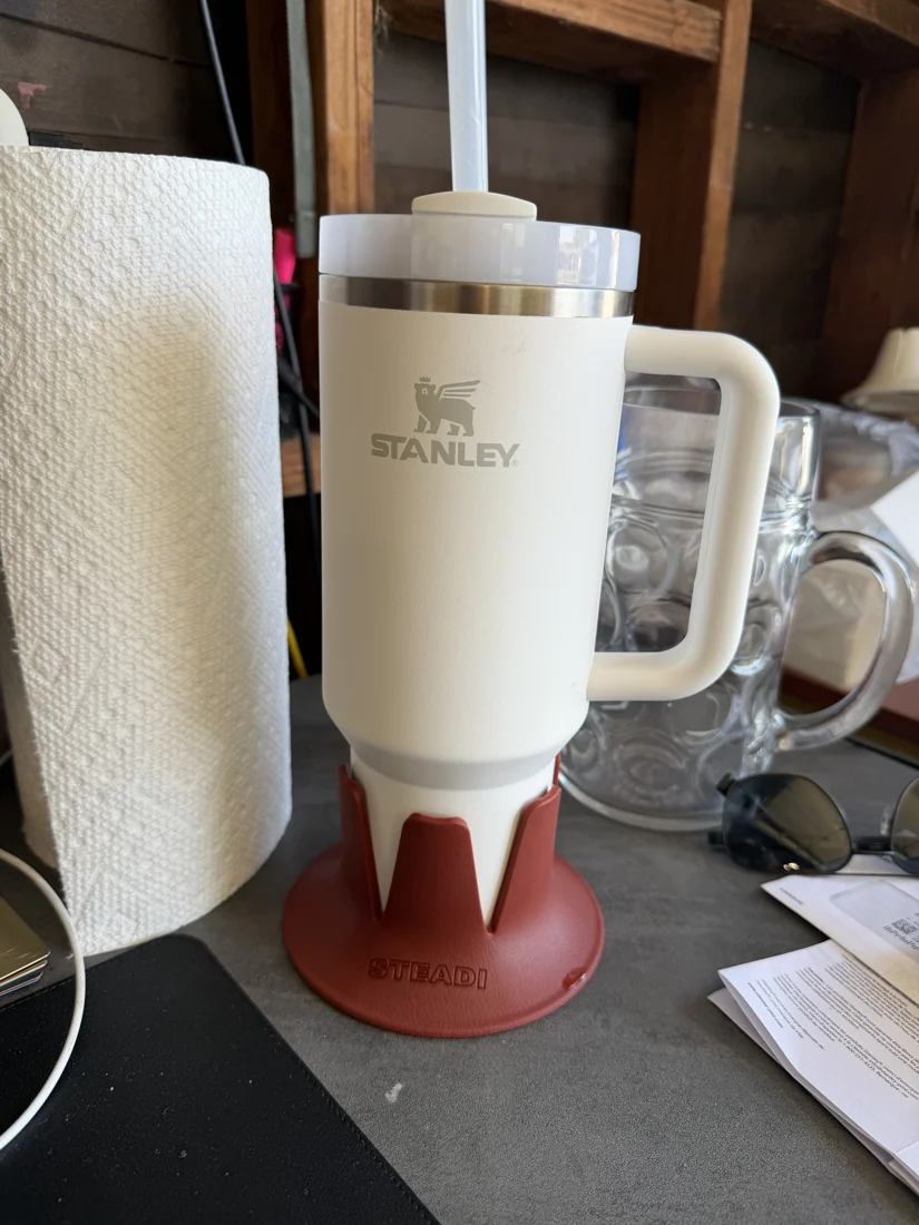 Exact Stanley Quencher H2.0 40 oz tumbler fitted in Terracotta Steadi, with handle clearance and full base visible